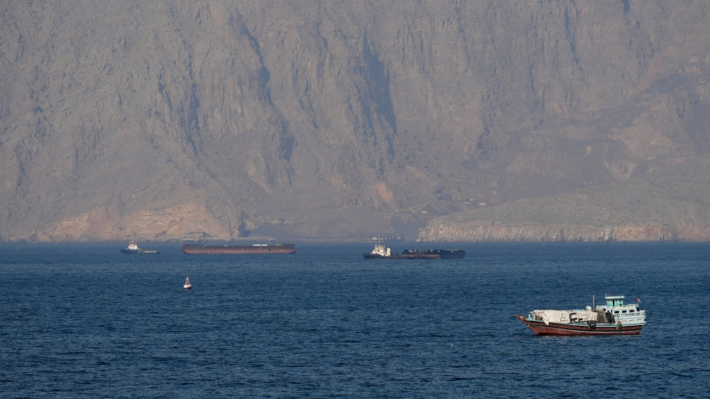 iran warns us to stay out of hormuz as trump plans ship escort mission