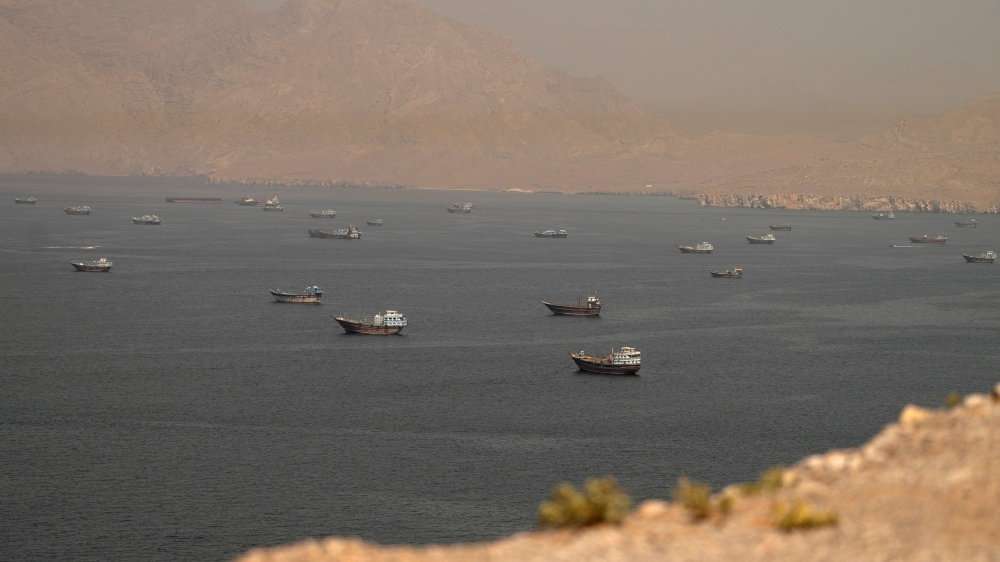 Strait of Hormuz Escort Operations Paused After Commercial Ship Hit in Suspected Attack Near Oman