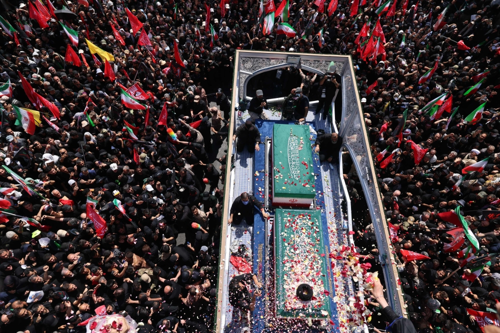 Millions gather in Tehran as Iran bids farewell to Supreme Leader Ali Khamenei